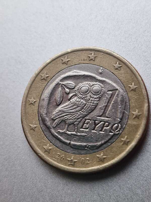 Moneda euro búho con s en la estrella
