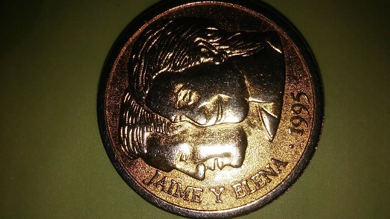 Foto 1 Moneda sin identificar: Quisiera saber si esta moneda tiene algun valor