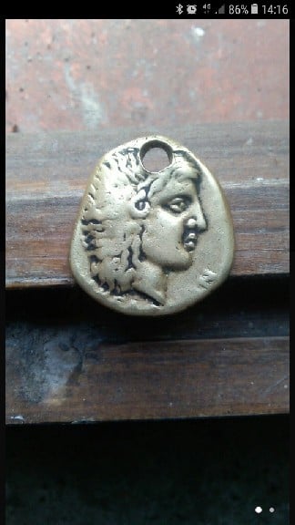 Foto 1 Moneda sin identificar: Moneda antigua