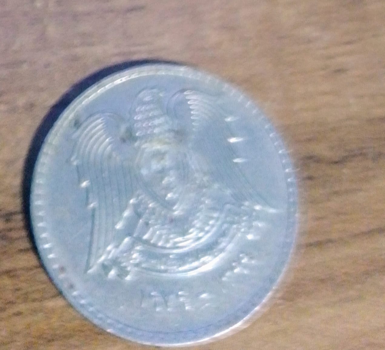 Foto 1 Moneda sin identificar: Alguno me dice de donde es esta moneda y si tiene valor?