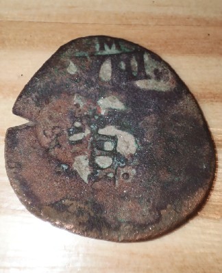 Foto 1 Moneda sin identificar: Monedas encontradas en el Mediterráneo murciano