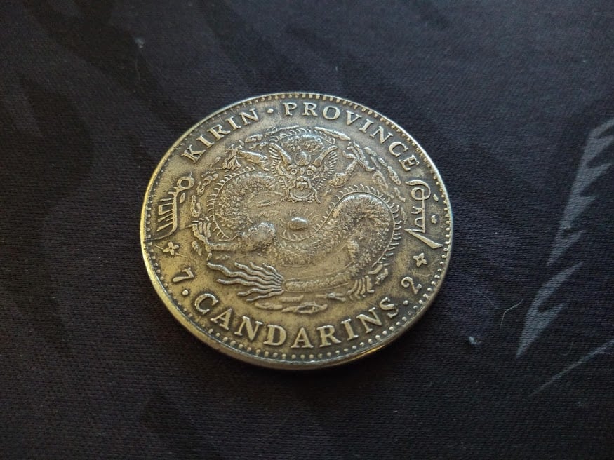 Foto 2 Moneda sin identificar: Me podrían decir que moneda es y cual es su valor?