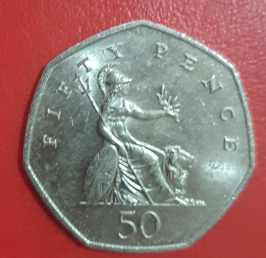 Foto 1 Moneda sin identificar: Saber si tiene valor