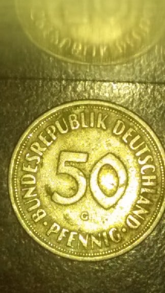 Foto 2 Moneda sin identificar: el materia que esta creada