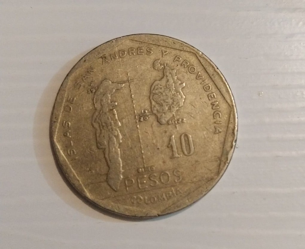 Foto 1 Moneda sin identificar: cuanto vale esta moneda?
