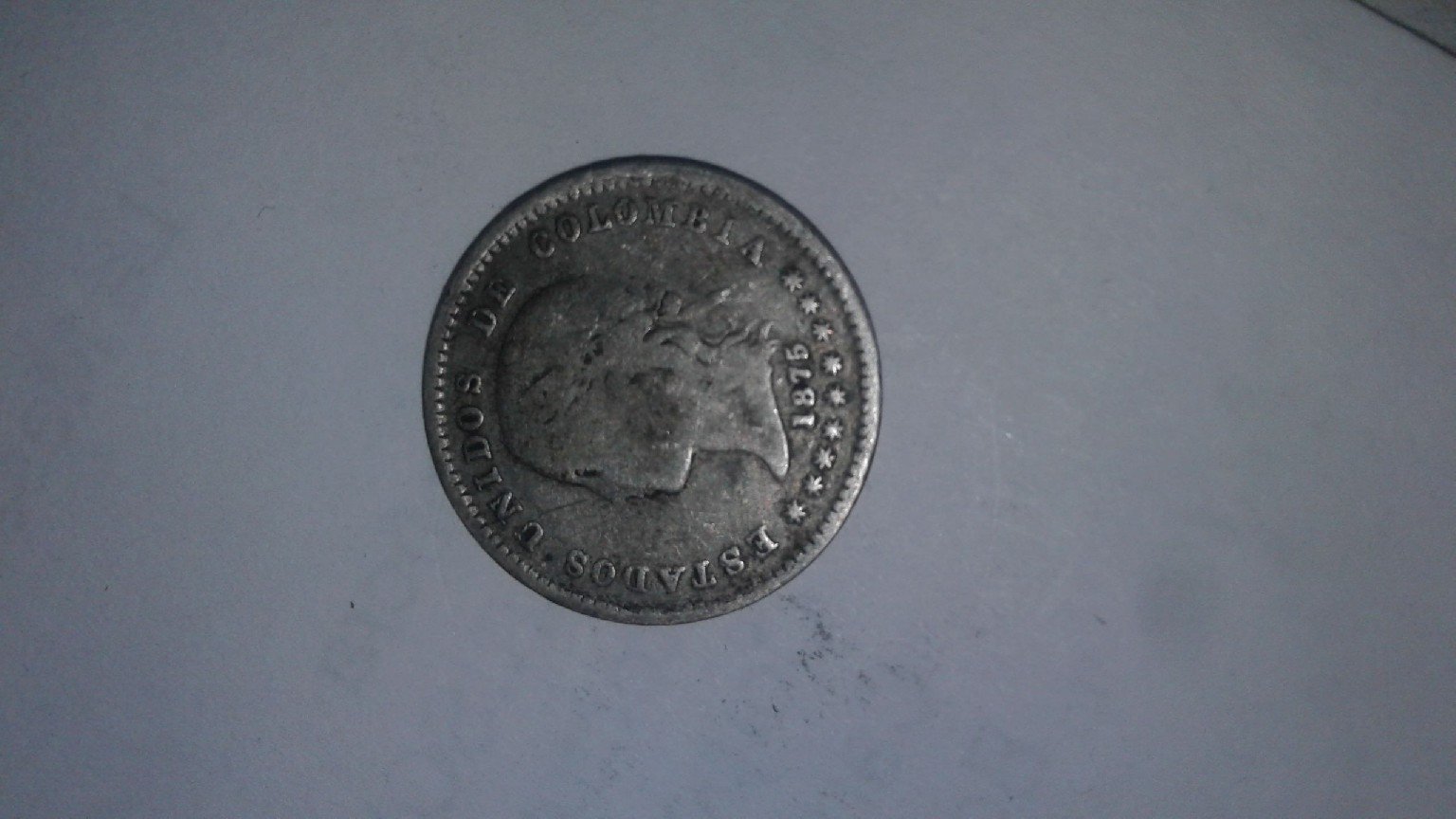 Foto 1 Moneda sin identificar: Moneda de 10 centavos; Año 1875 Estados Unidos de colombia