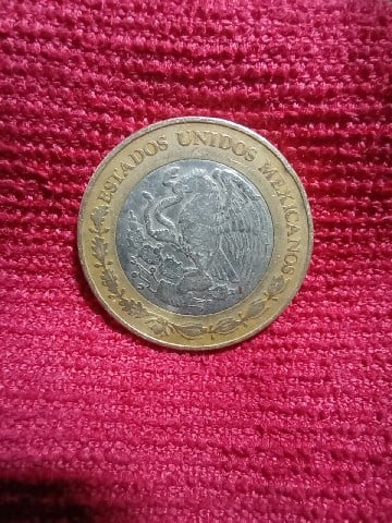 Foto 2 Moneda sin identificar: Es error o desgaste por el tiempo