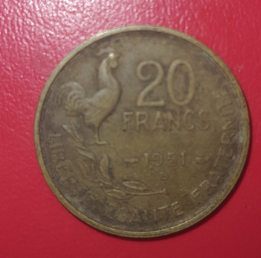 Foto 2 Moneda sin identificar: Tiene valor?