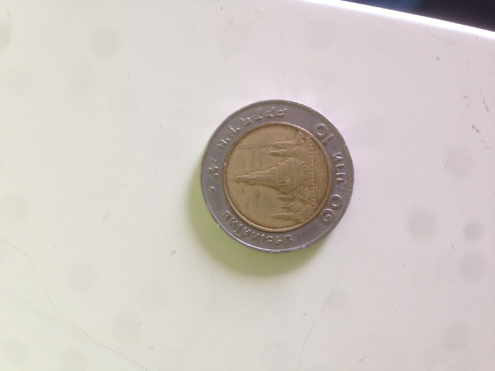 Foto 1 Moneda sin identificar: Moneda desconocida