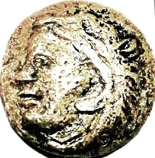 Foto 1 Moneda sin identificar: Me podrían ayudar a identificar está moneda