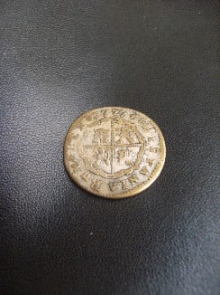Foto 1 Moneda sin identificar: moneda muy gastada