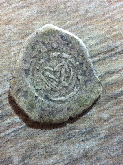 Foto 2 Moneda sin identificar: Al pareces es de Plata no logro dar con información que me indique de que moneda se trata