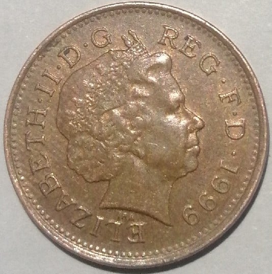 Foto 2 Moneda sin identificar: Moneda one penny del año 1999