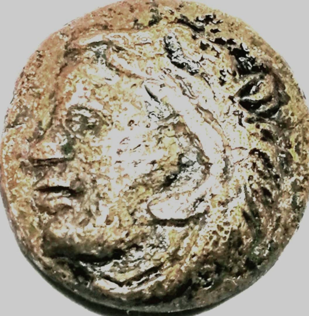 Foto 1 Moneda sin identificar: Me podrían ayudar a identificar está moneda