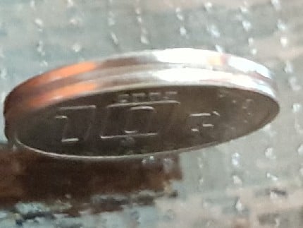 Foto 2 Moneda sin identificar: Moneda de 50 centavos error en el canto